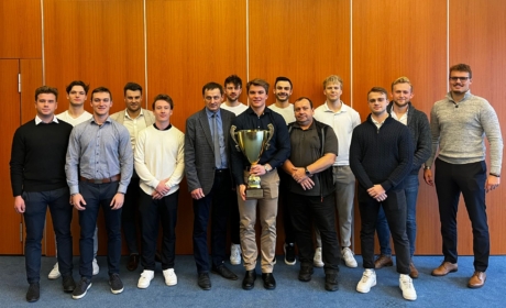 The rector’s celebratory lunch with the winning hockey players of the Battle of Prague